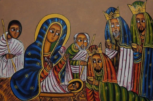 Artwork depicting the adoration of the magi.